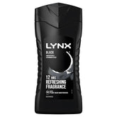 Lynx Black Shower Gel (225ml) in a black bottle with crescent design offers 12-hour refreshing fragrance and plant-based moisturisers. Experience its masculine scent, blending frozen pear with cedarwood.